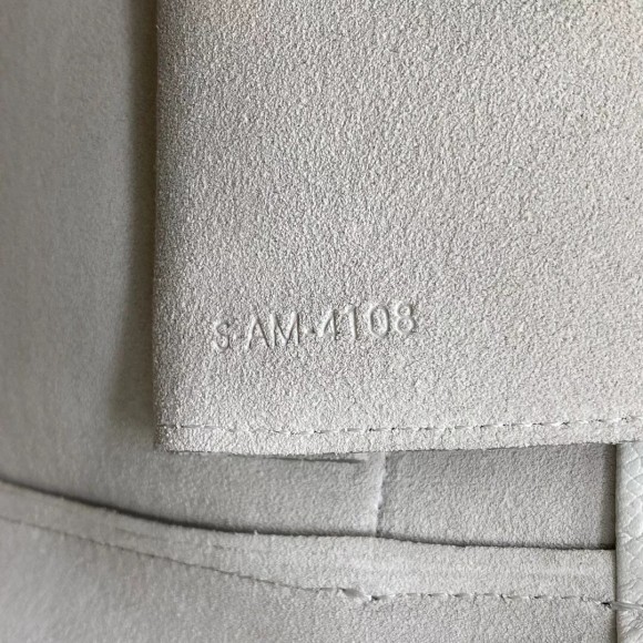 Ce**e micro belt bag in white grained calfskin