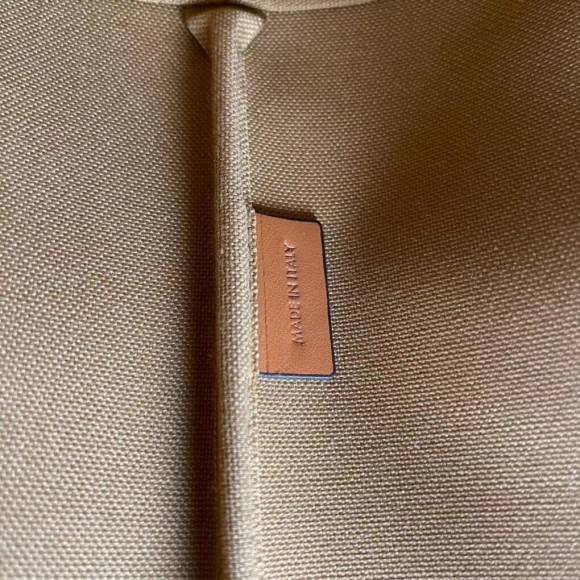 Ce**e small bucket bag in tan triomphe canvas