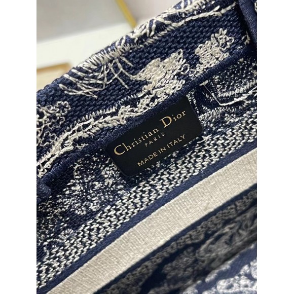 D*or small book tote bag in blue toile de jouy reverse embroidery
