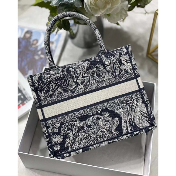 D*or small book tote bag in blue toile de jouy reverse embroidery