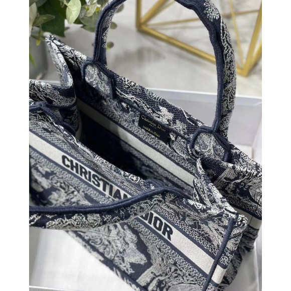 D*or small book tote bag in blue toile de jouy reverse embroidery