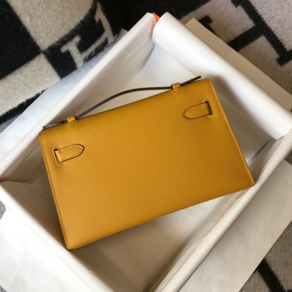 H**mes kelly pochette clutch bag in yellow epsom leather