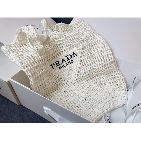 Pra*a large tote bag in white woven raffia