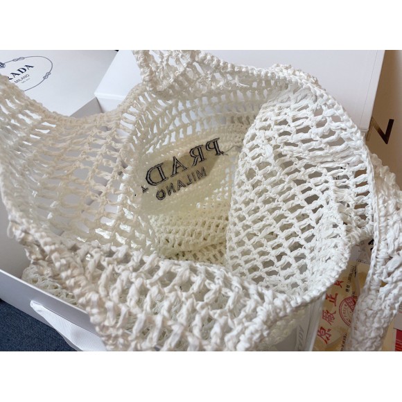 Pra*a large tote bag in white woven raffia