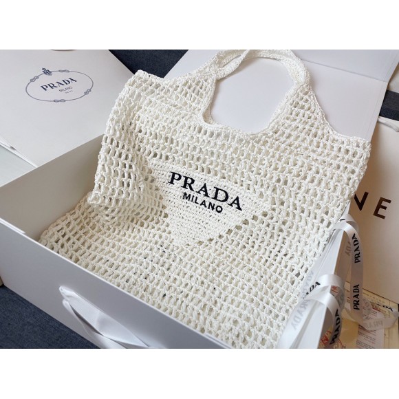 Pra*a large tote bag in white woven raffia